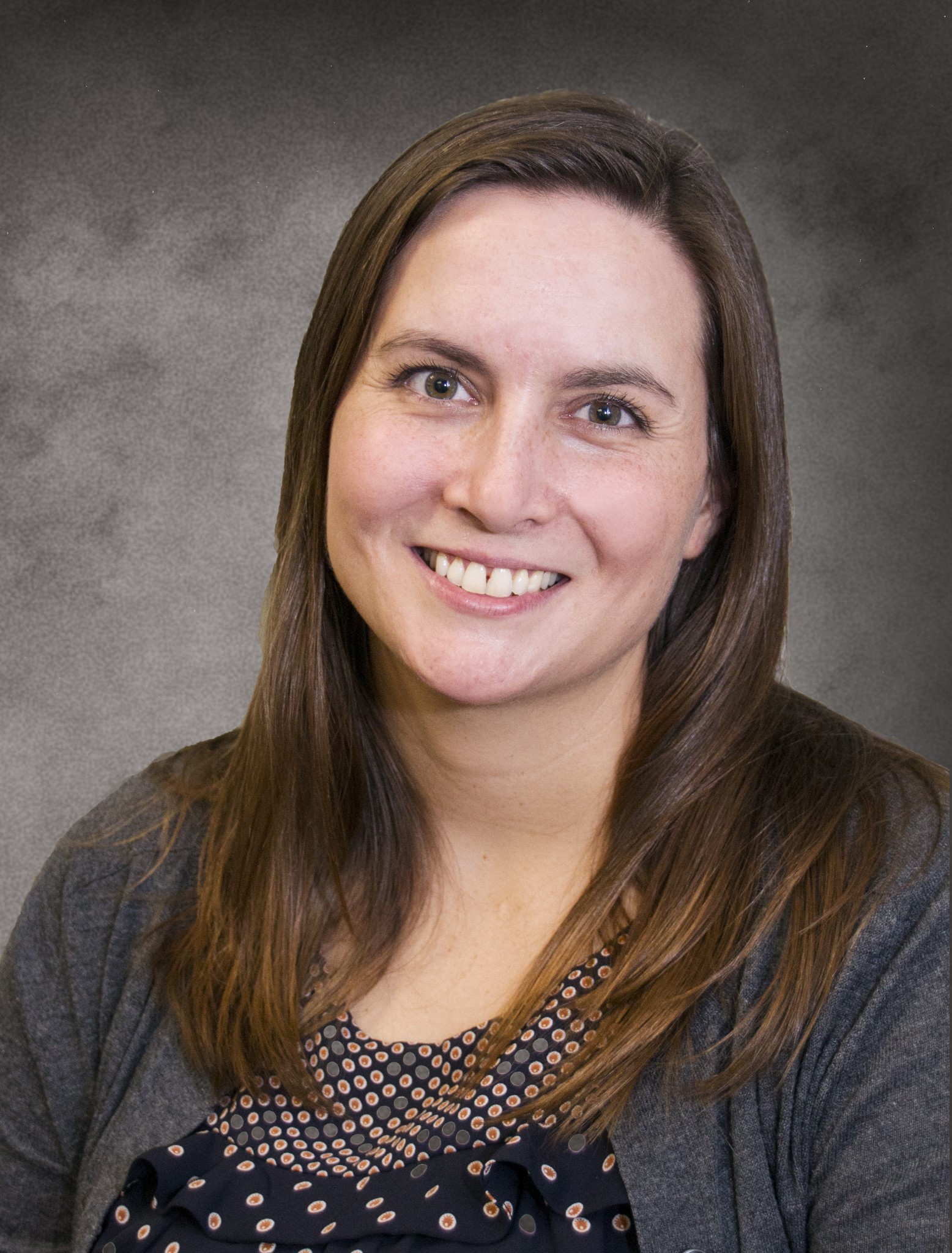 a person smiling at the camera