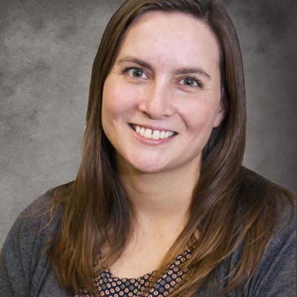 a person smiling at the camera