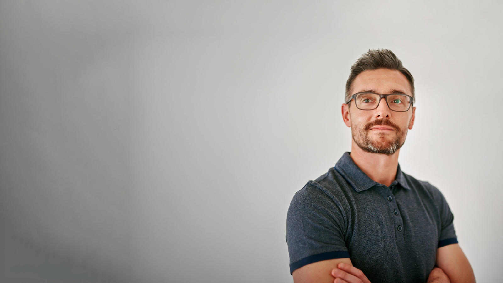 a man with glasses and a beard