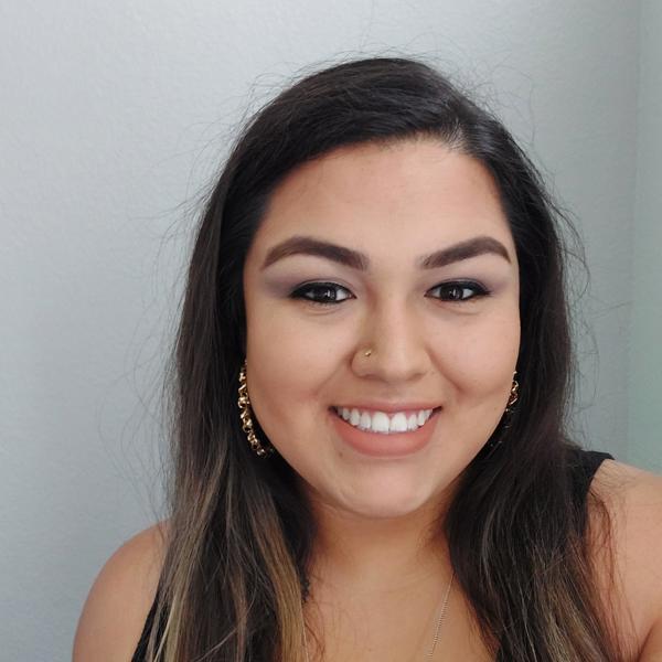a woman smiling for a selfie