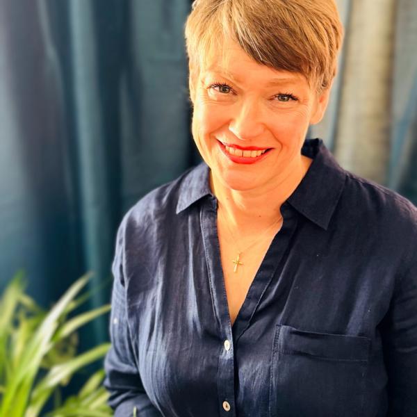 a person smiling for a picture