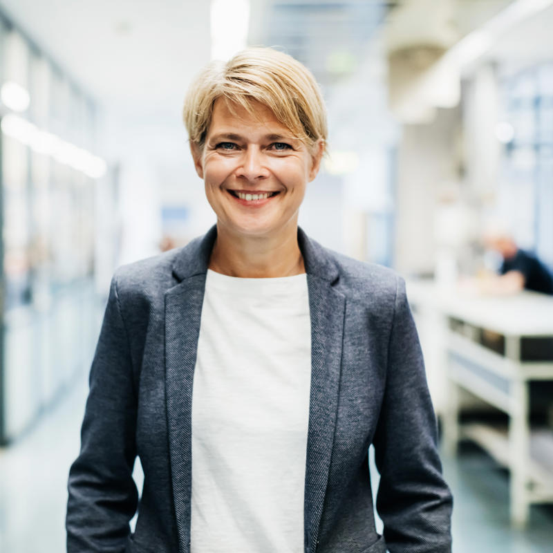 a woman smiling at camera
