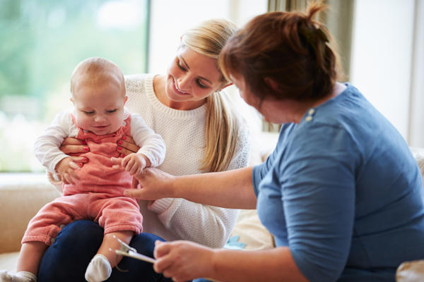 a person holding a baby