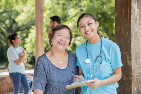 a person and a young person smiling