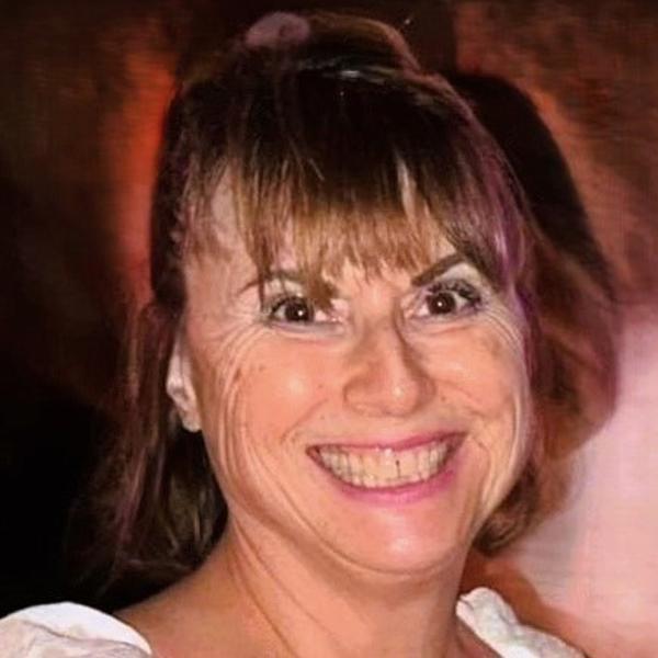 a woman smiling at camera