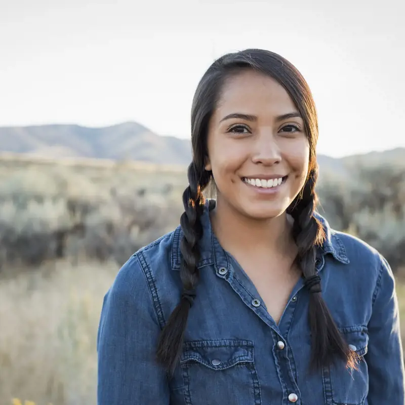 a woman smiling at camera
