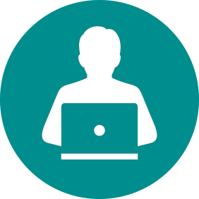 a person sitting at a laptop