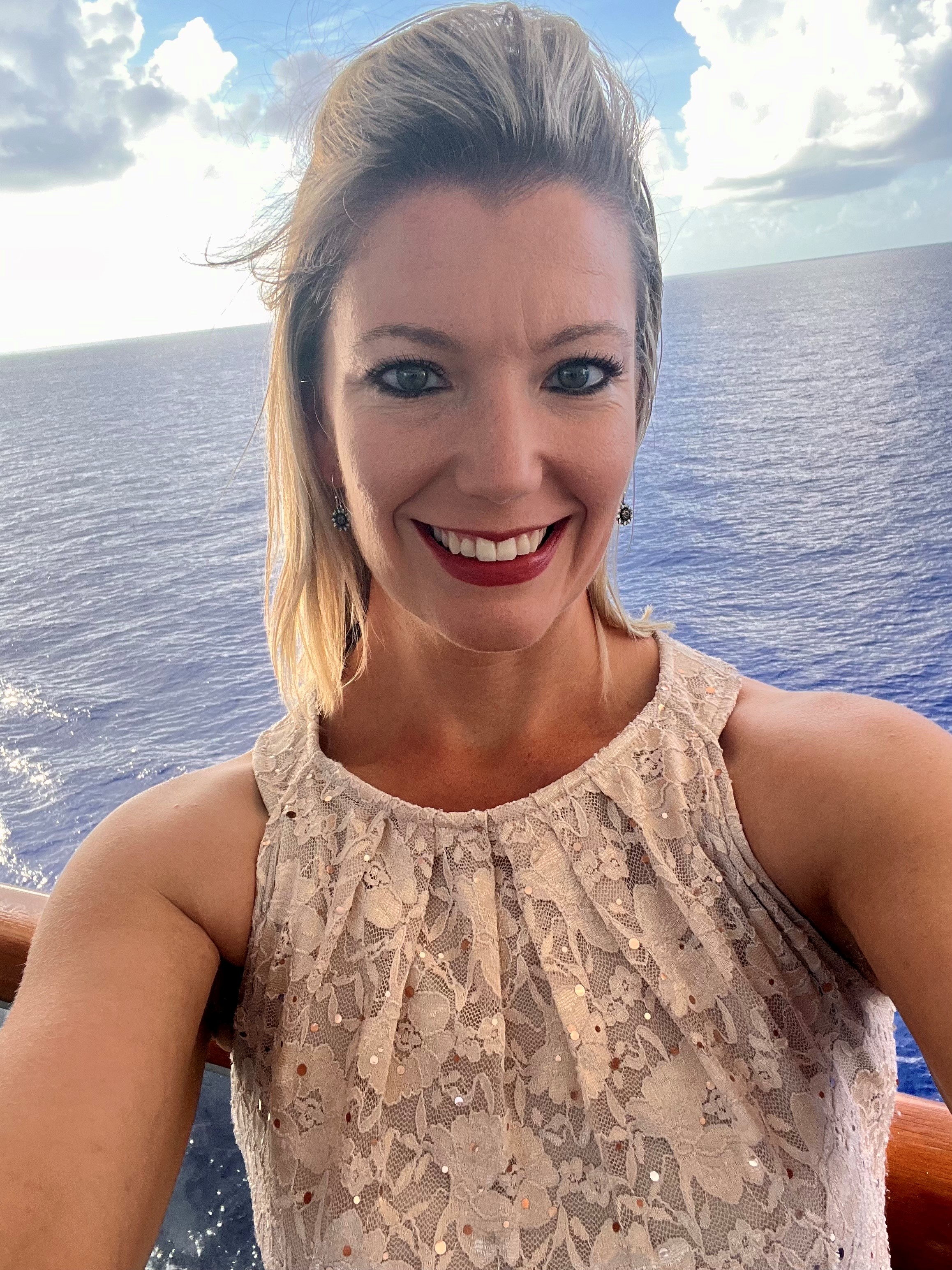 a person taking a selfie on a boat
