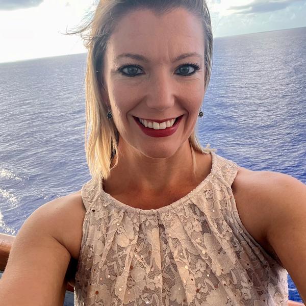 a person taking a selfie on a boat
